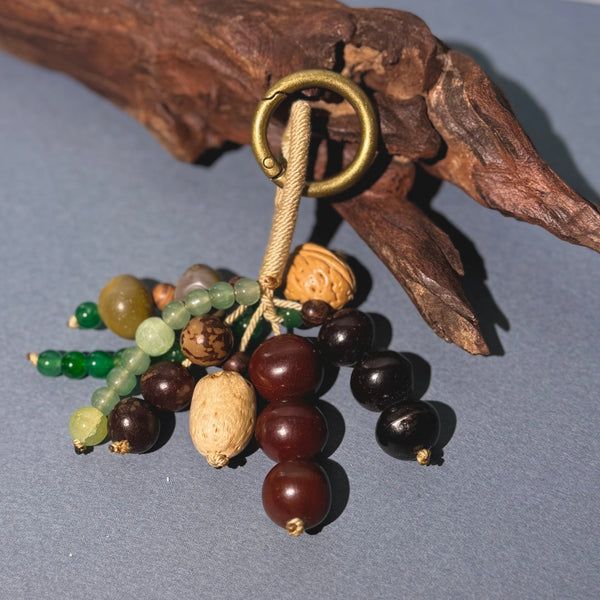 "Bishan" Pendentif de sac et porte-clés et en graines naturelles – Style oriental artisanal